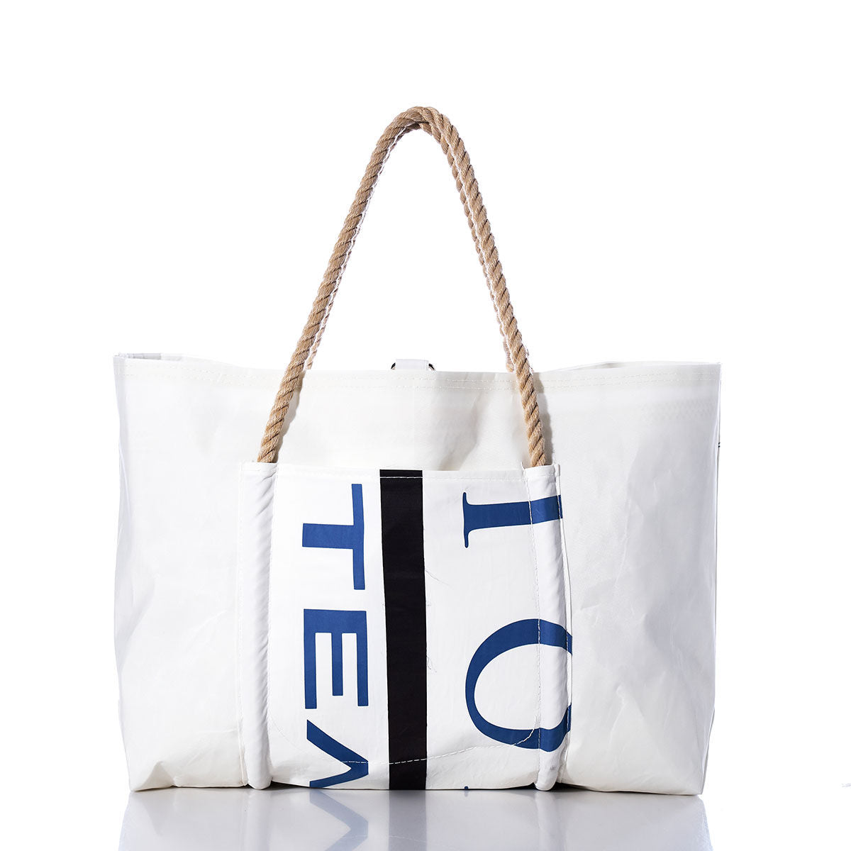 Vintage Black Trident Wharf Tote by Sea Bags, featuring a blue and black partial text design on white recycled sailcloth with two tan rope handles, photographed on a white background. Handmade in Portland, Maine, this tote blends nautical style with sustainable craftsmanship. by Sea Bags