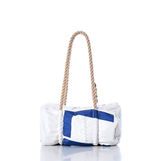 The Sea Bags Vintage 527 Baguette Bag is a white and blue rectangular tote featuring subtle sail insignias and a thick, hand-spliced hemp rope handle, displayed on a white background. by Sea Bags
