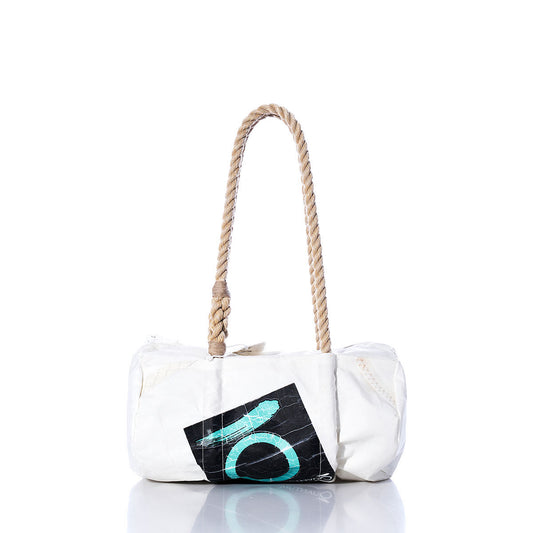 Vintage Quantum Baguette Bag by Sea Bags, featuring hemp rope handles and a black patch with a teal circular design inspired by classic sail insignias, displayed on a white background. by Sea Bags