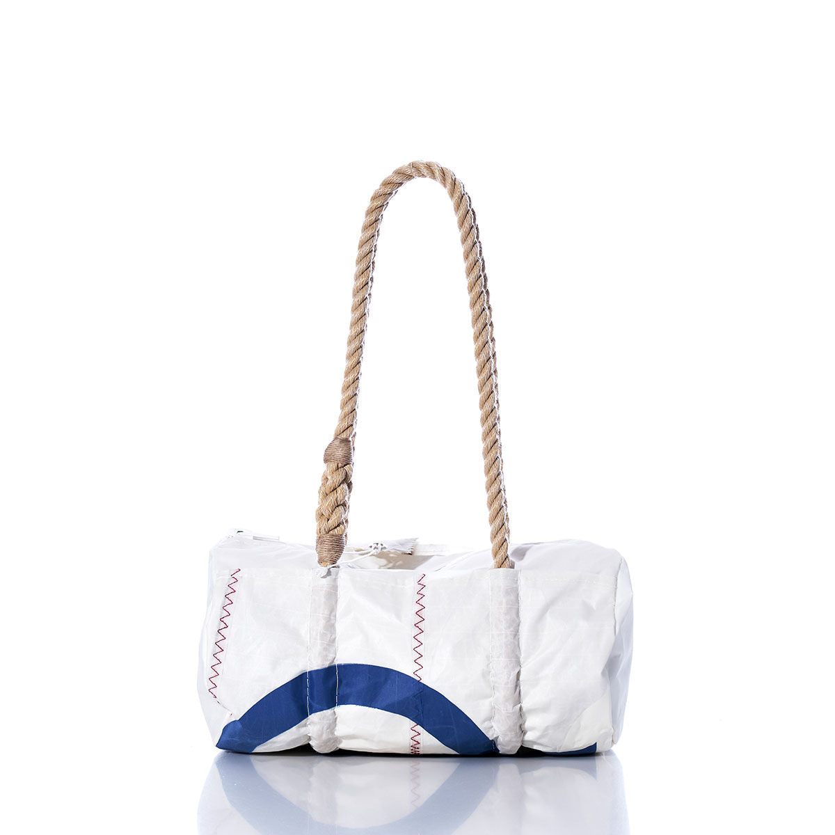 The Vintage Optimist Baguette Bag by Sea Bags features a white body with blue accents, red stitching, and thick rope handles, photographed on a white reflective surface—adding classic nautical charm to your collection. by Sea Bags