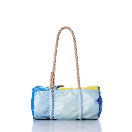 The Sea Bags Vintage Blue and Yellow Baguette Bag features a rectangular design crafted from recycled sails, with a thick, hand-spliced hemp rope handle, shown against a white background. by Sea Bags