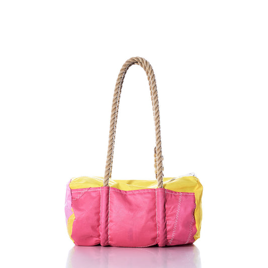 The Sea Bags Vintage Yellow and Pink Baguette Bag, made from recycled sail with hemp rope handles, is shown on a white background. by Sea Bags