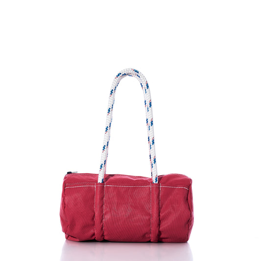Red bag with a white rope handle on a white background
