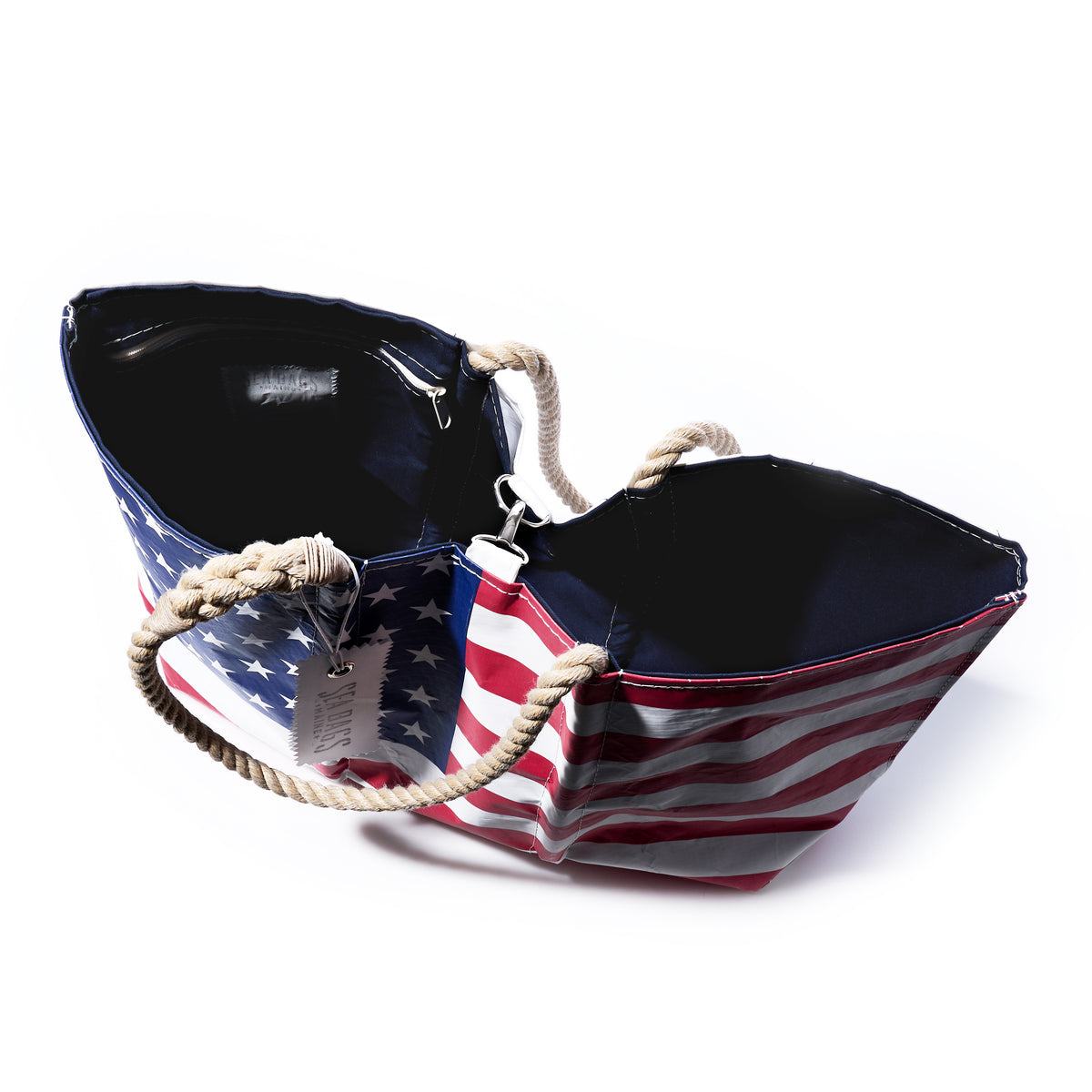 The Sea Bags Vintage Limited Edition American Flag Large Tote is handcrafted in the USA from recycled sail cloth, features sturdy rope handles, and is pictured from above against a white background.