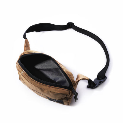 Sea Bags Vintage Caramel Tanbark Belt Bag in recycled tan brown sail cloth, featuring an open zippered main compartment and an adjustable black strap with a side-release buckle.