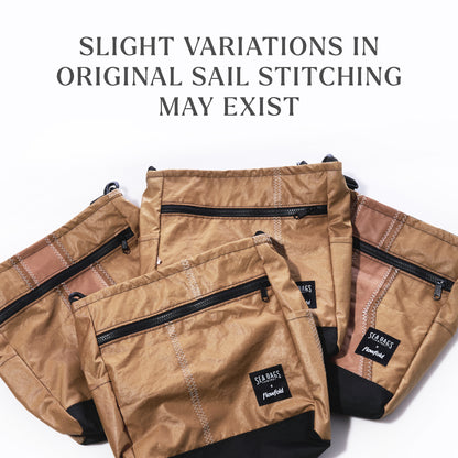 Four caramel tanbark Vintage Caramel Tanbark Voyager Medium Crossbody bags made from vintage recycled sail cloth with zigzag stitching, arranged on a white background with a note on stitch variations.