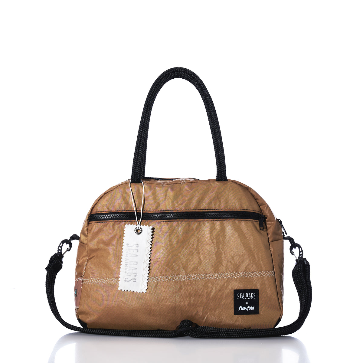 Vintage Caramel Tanbark Essential Weekender bag in caramel-colored tanbark with black rope handles, a trolley sleeve, and a detachable shoulder strap.