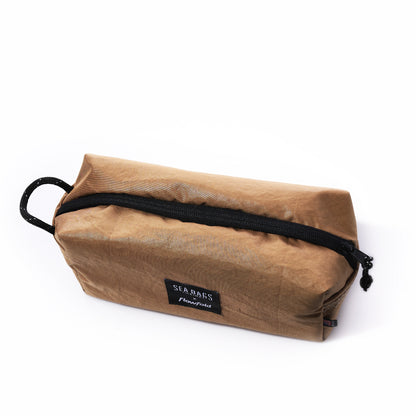 Sea Bags Vintage Caramel Tanbark rectangular toiletry bag with a black zipper and side loop.