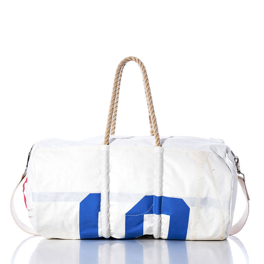 Sea Bags Vintage US Duffel: a white duffel bag featuring blue number detailing, hemp rope handles, and a detachable shoulder strap, expertly crafted from recycled sail cloth and shown on a white background. by Sea Bags