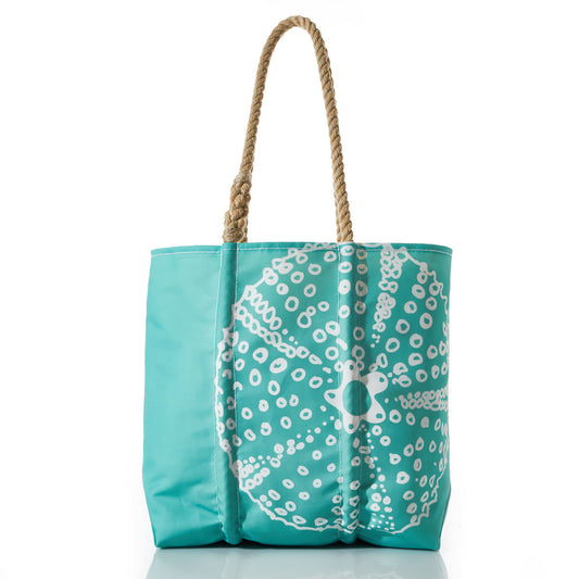 The Sea Bags Sea Urchin Tote is a turquoise recycled sail bag featuring a white sea urchin design and two twisted rope handles, designed for durability and shown against a white background. by Sea Bags
