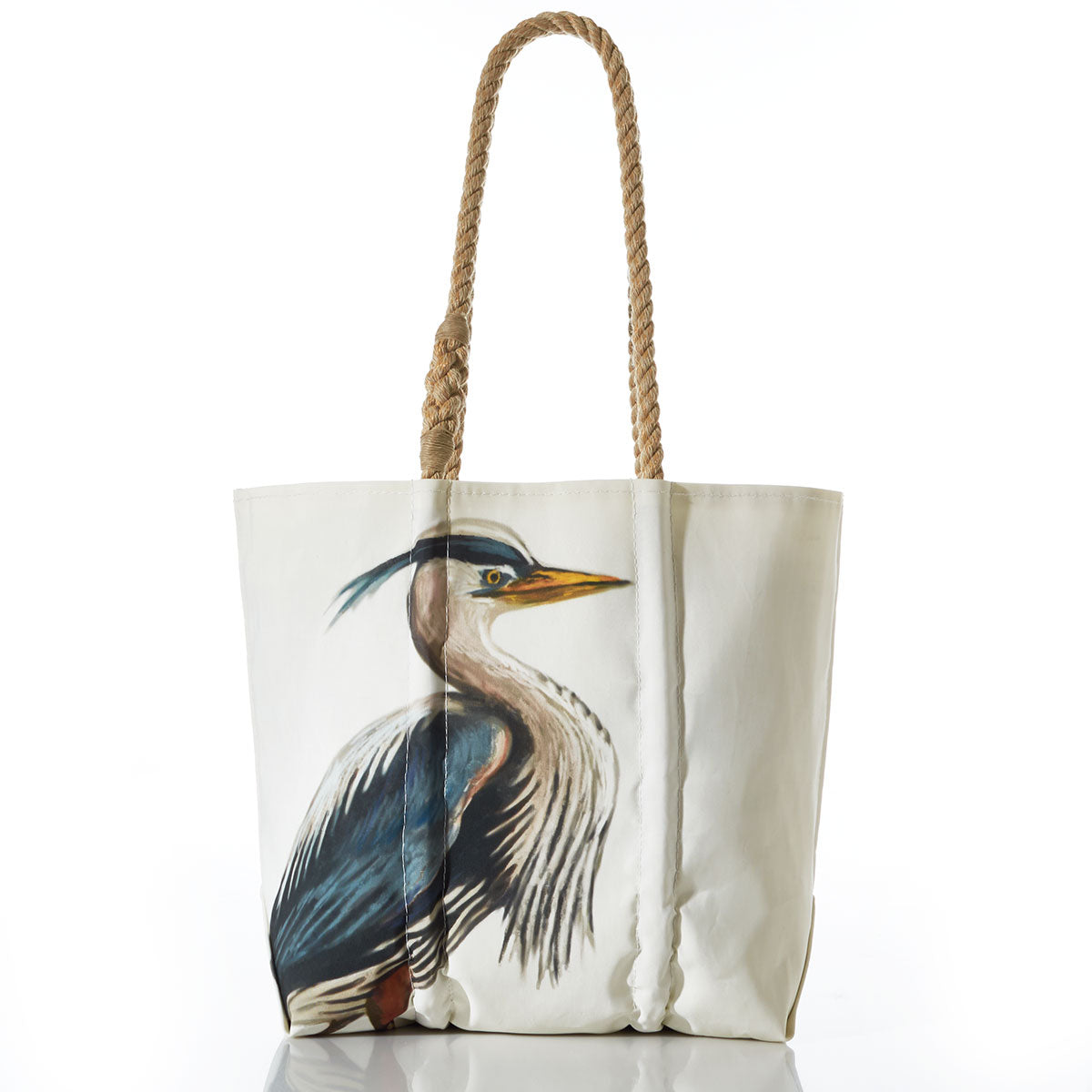 The Sea Bags Great Blue Heron Medium Tote features braided rope handles and a painted heron, crafted from recycled sail cloth for the Anniversary Archive Collection.