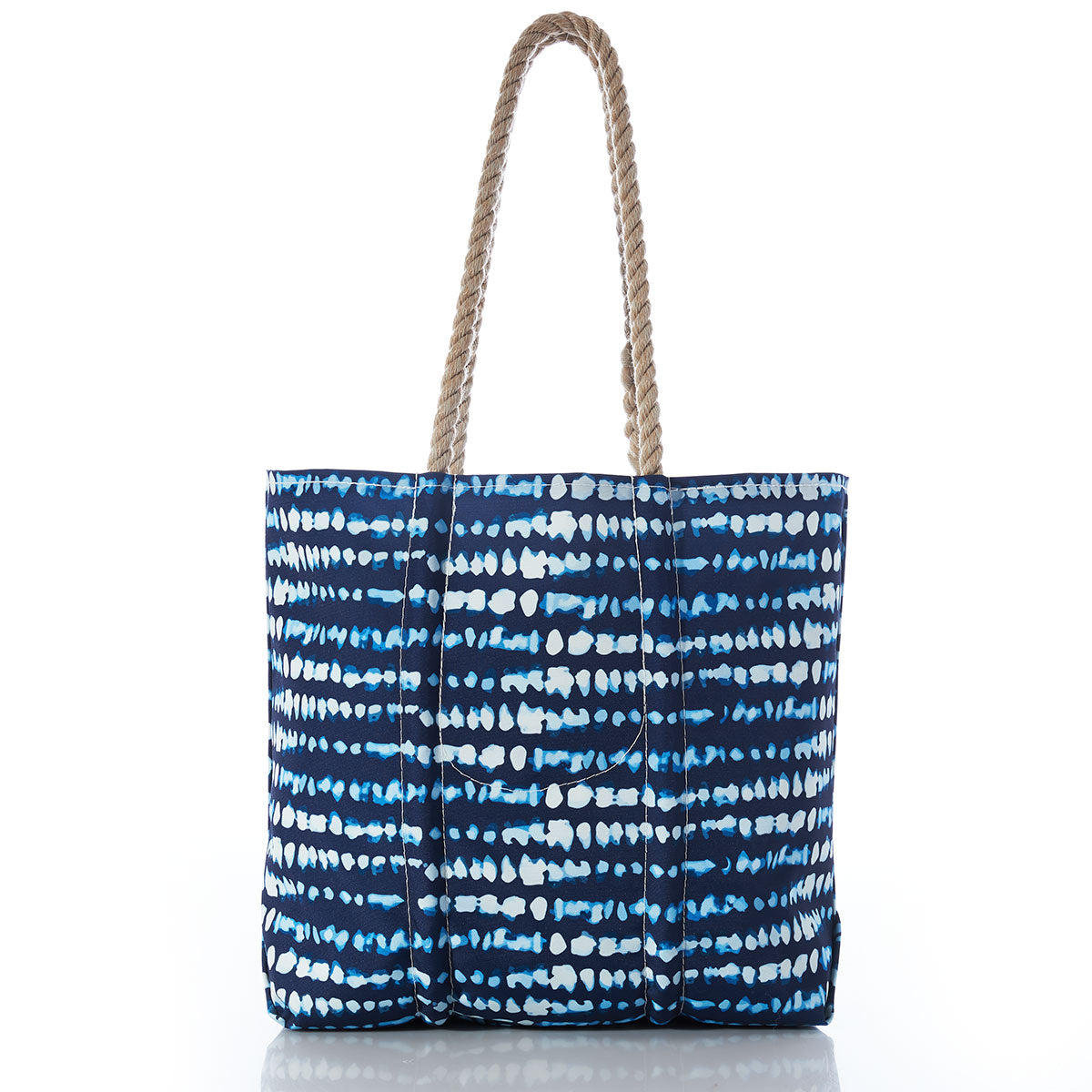 Sea Bags White Anchor on Shibori Print Tote, featuring a striking blue and white shibori pattern with two tan rope handles, displayed upright against a white background—a versatile nautical accessory designed for both style and function. by Sea Bags