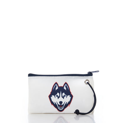 The UCONN Wristlet by Sea Bags is an eco-friendly pouch made from recycled sail cloth, showcasing a navy and red husky dog logo on the front and finished with a black wrist strap—perfect for everyday use while displaying your school pride. by Sea Bags