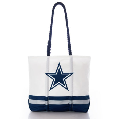 Introducing the Dallas Cowboys Medium Tote by Sea Bags—a durable white tote bag made from recycled sail cloth, featuring navy handles, navy and gray stripes at the bottom, and a prominent navy star outlined in gray on the front—perfect for Dallas Cowboys fans. by Sea Bags