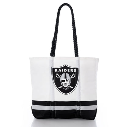 The Sea Bags Las Vegas Raiders Medium Tote is an eco-friendly bag crafted from recycled sail cloth, featuring the Raiders logo on white with black rope handles and two black horizontal stripes near the bottom—all shown on a white background. by Sea Bags