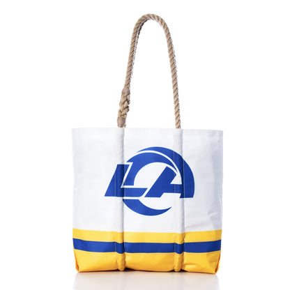 Sea Bags Los Angeles Rams Medium Tote, featuring a blue and yellow team logo, coordinating stripes at the bottom, and durable brown rope handles, crafted from recycled sail cloth and photographed on a white background. by Sea Bags