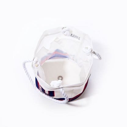 Sea Bags New York Giants Beverage Bucket—crafted from white sail cloth with sturdy rope handles, a round metal grommet at the base, and featuring a blue and red striped pattern for a distinctive nautical look. by Sea Bags