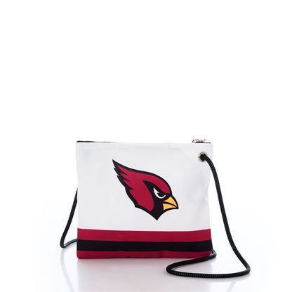 The Sea Bags Arizona Cardinals Slim Crossbody is a stylish and sustainable white crossbody bag featuring a black strap, the Arizona Cardinals logo, and two horizontal red and black stripes near the base—perfect for any Cardinals fan. Photographed on a white background. by Sea Bags
