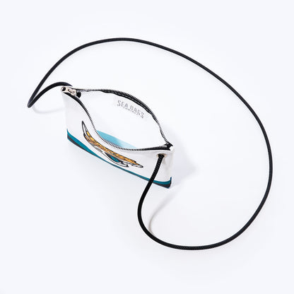 Jacksonville Jaguars Slim Crossbody by Sea Bags, crafted from recycled sail cloth, features a compact white design with team logo graphics, black cord strap, zipper closure, and SEA BAGS branding printed inside the lining. by Sea Bags