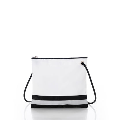 The Las Vegas Raiders Slim Crossbody by Sea Bags is a small white zippered shoulder bag made from recycled sail cloth, featuring a black strap and a black and gray stripe near the bottom, displayed on a white background. by Sea Bags