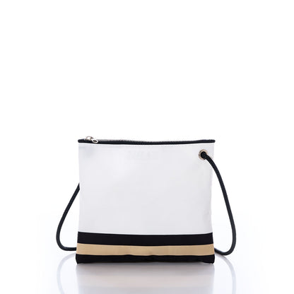 The Sea Bags New Orleans Saints Slim Crossbody is a small white crossbody bag crafted from recycled sail cloth, featuring a black and beige stripe near the bottom, black trim, a black strap, and a silver zipper. by Sea Bags