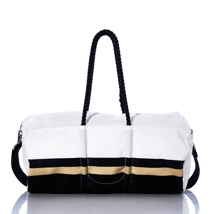 Show your team spirit on the go with the New Orleans Saints Duffel by Sea Bags. Featuring a striking white design accented by black handles, a black shoulder strap, and bold gold-and-black horizontal stripes near the base, this duffel combines sporty style and everyday practicality—perfect for fans heading to the gym or traveling to catch a weekend game. by Sea Bags