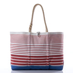 Sea Bags Red Stripe Ogunquit Beach Tote, a limited edition bag featuring red and white stripes, rope handles, and a blue base, displayed against a white background.