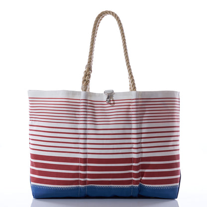 Sea Bags Red Stripe Ogunquit Beach Tote, a limited edition bag featuring red and white stripes, rope handles, and a blue base, displayed against a white background.