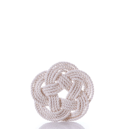 A circular Nautical Sailor Knot Coasters-Natural made of off-white rope.