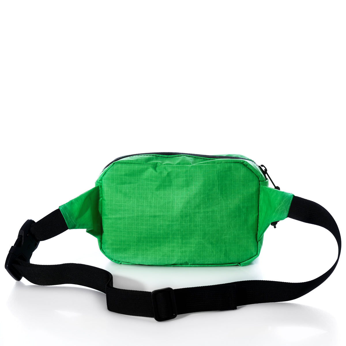 The Sea Bags Vintage Lime Green Crew Belt Bag, made from sustainable green fabric and featuring a front zip pocket and an adjustable black strap, is displayed against a white background. by Sea Bags