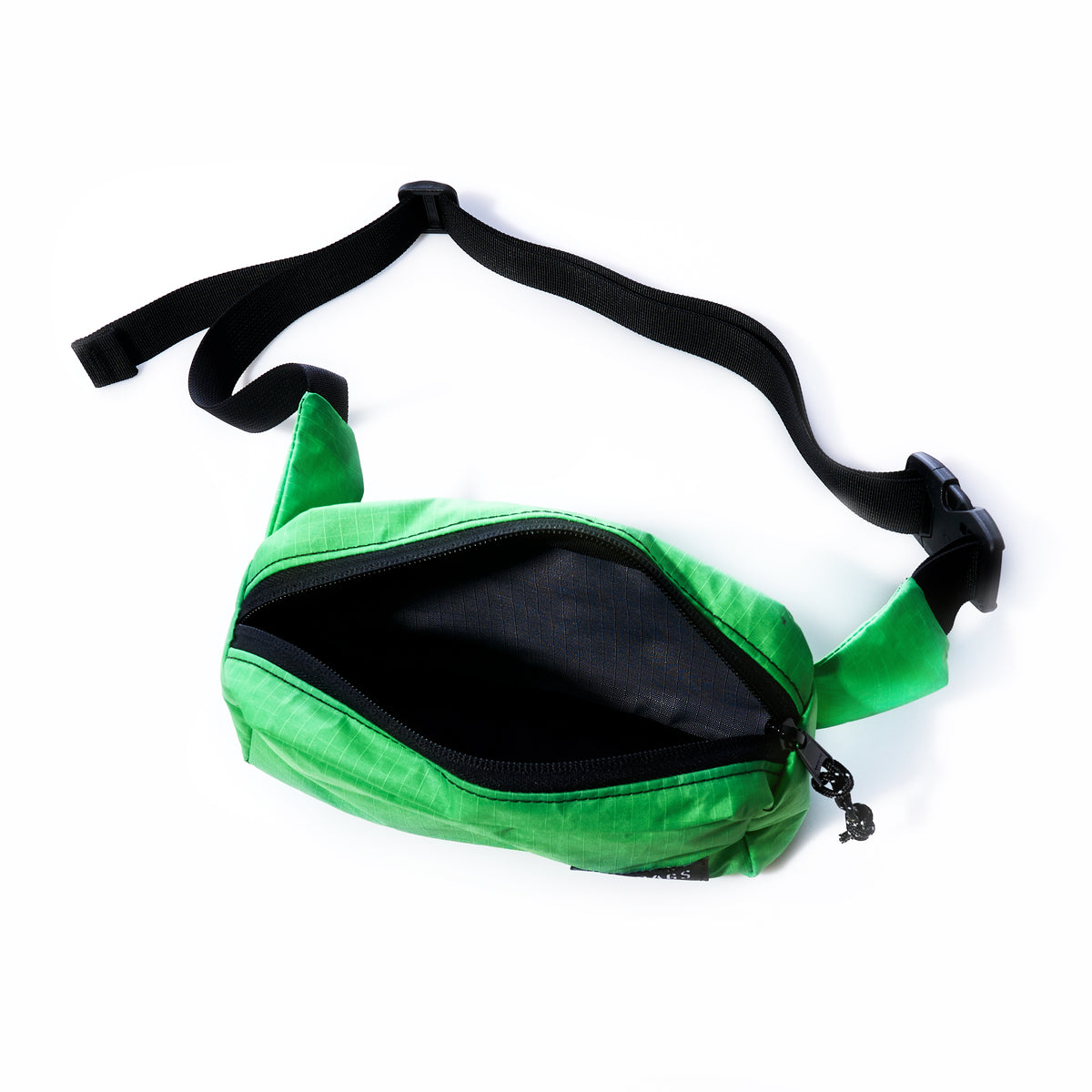 The Vintage Lime Green Crew Belt Bag by Sea Bags is a compact, bright green zippered waist pouch featuring a black adjustable strap and buckle, displayed open to reveal its black interior lining—this sustainably crafted belt bag is thoughtfully designed for everyday convenience. by Sea Bags