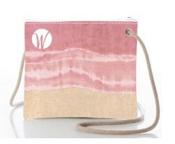 Introducing the Sea Bags Shoreline Blush Slim Crossbody—a compact square crossbody bag crafted from durable sailcloth, featuring a beige and pink wavy pattern, rope strap, and finished with a white circular W logo on the top left corner. by Sea Bags