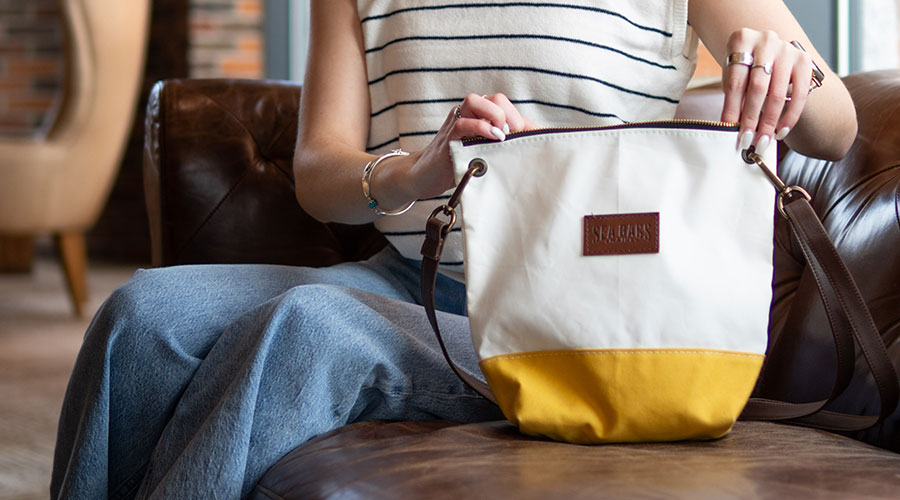 Woman with Yellow Chebeague Crossbody over the shoulder