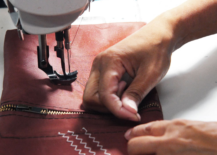 Heritage Tanbark Crossbody being sewn