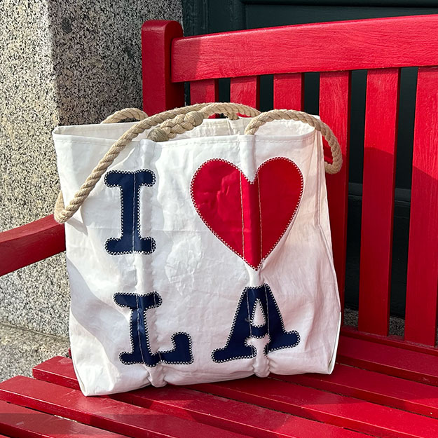 I Love LA Tote on a red bench