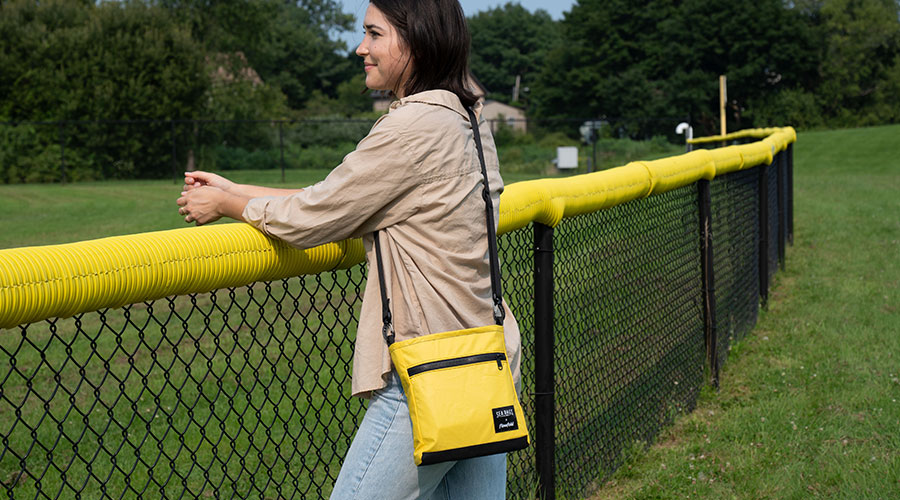 Woman with Vintage Voyager Crossbody Bag