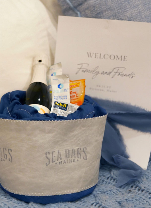 A Sea Bags Ditty Bag waits on the bed for the wedding party to arrive, and holds all necessities for the special day.