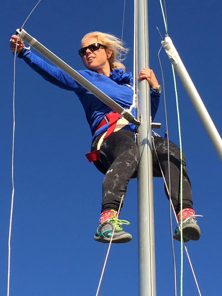 Erica Beck Spencer, named the Top Female Skipper in 2017, fixing the jib halyard