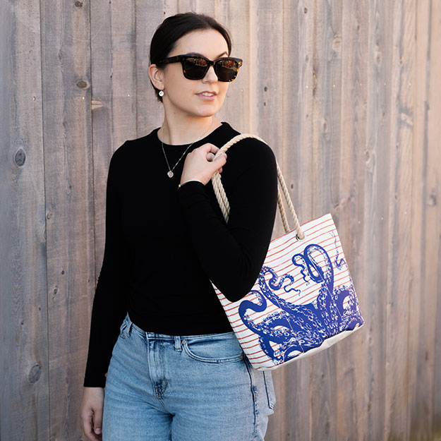 Woman wearing Blue Octopus Essential Handbag