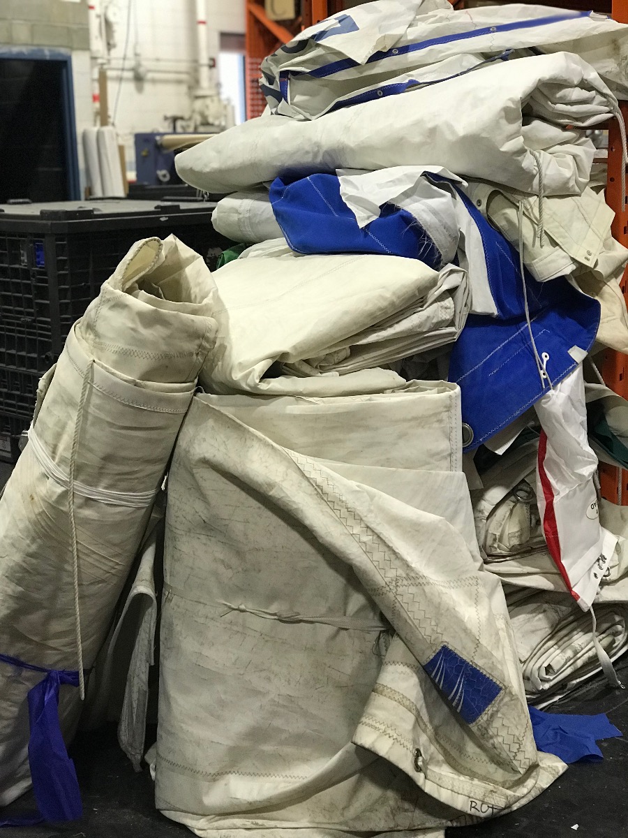 Pile of used sails in the warehouse