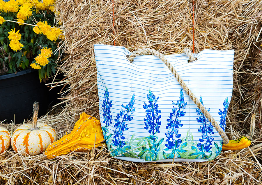 New Lupine Sailor Stripe Essential Handbag on a fall display