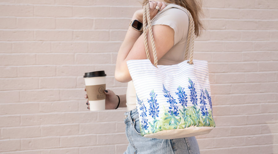 Woman Carrying Lupine Stripe Essential Handbag