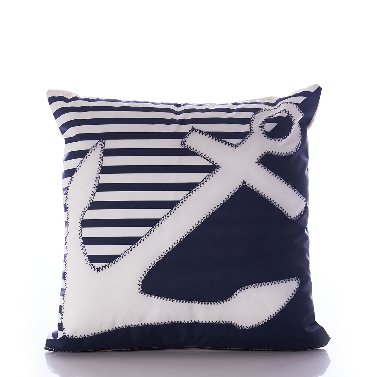 the breton stripe white anchor pillow is embellished with a white anchor in front of a solid navy bottom corner and a navy and white striped top corner