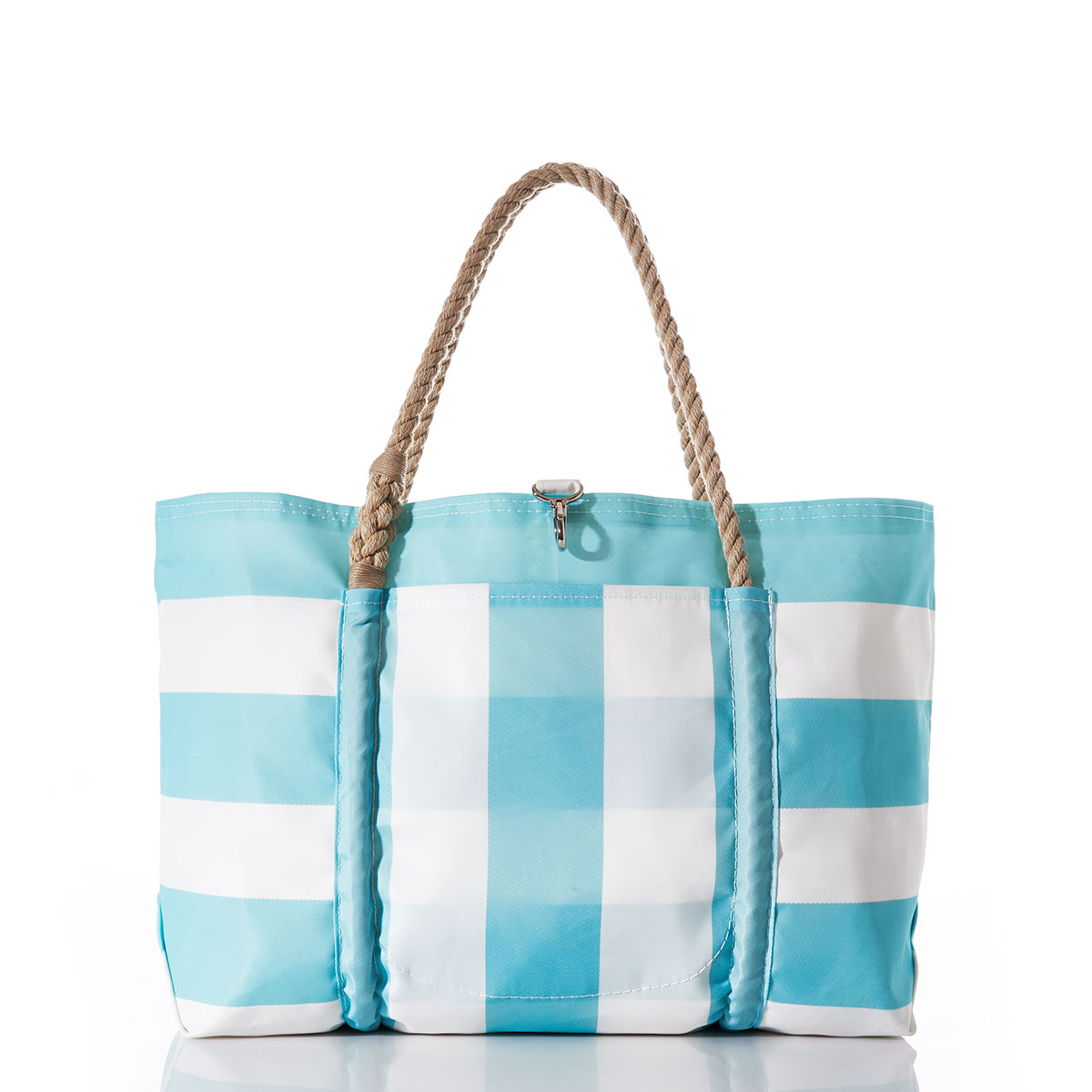 aquamarine and white plaid stripes adorn the front of a recycled sail cloth tote with hemp rope handles and a top metal clasp