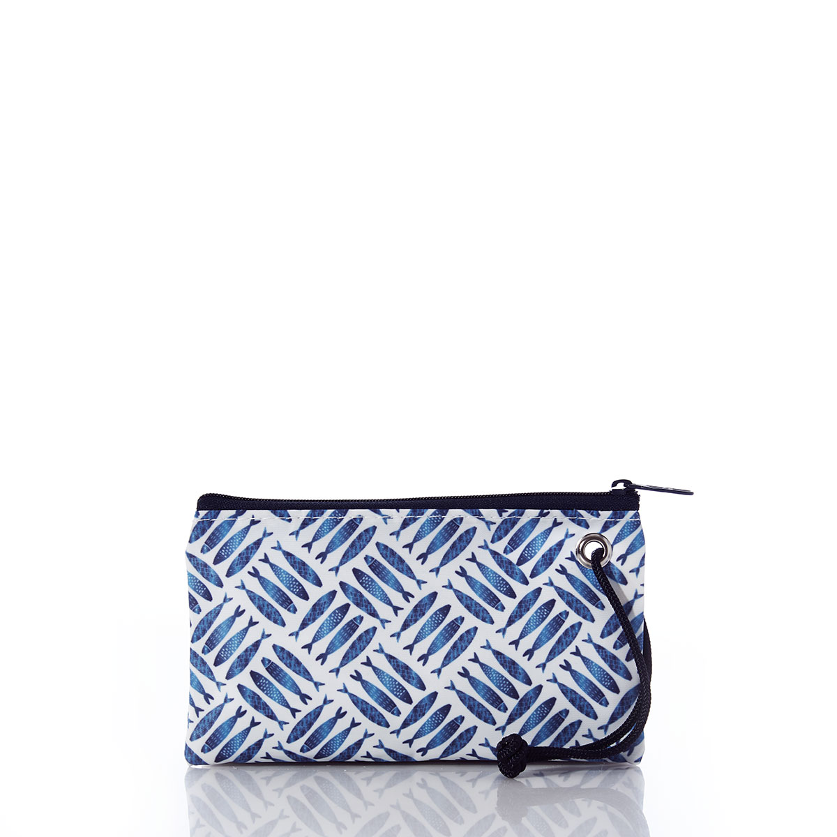 criss cross print of blue school of fish on recycled sail cloth wristlet with navy zipper and wristlet strap