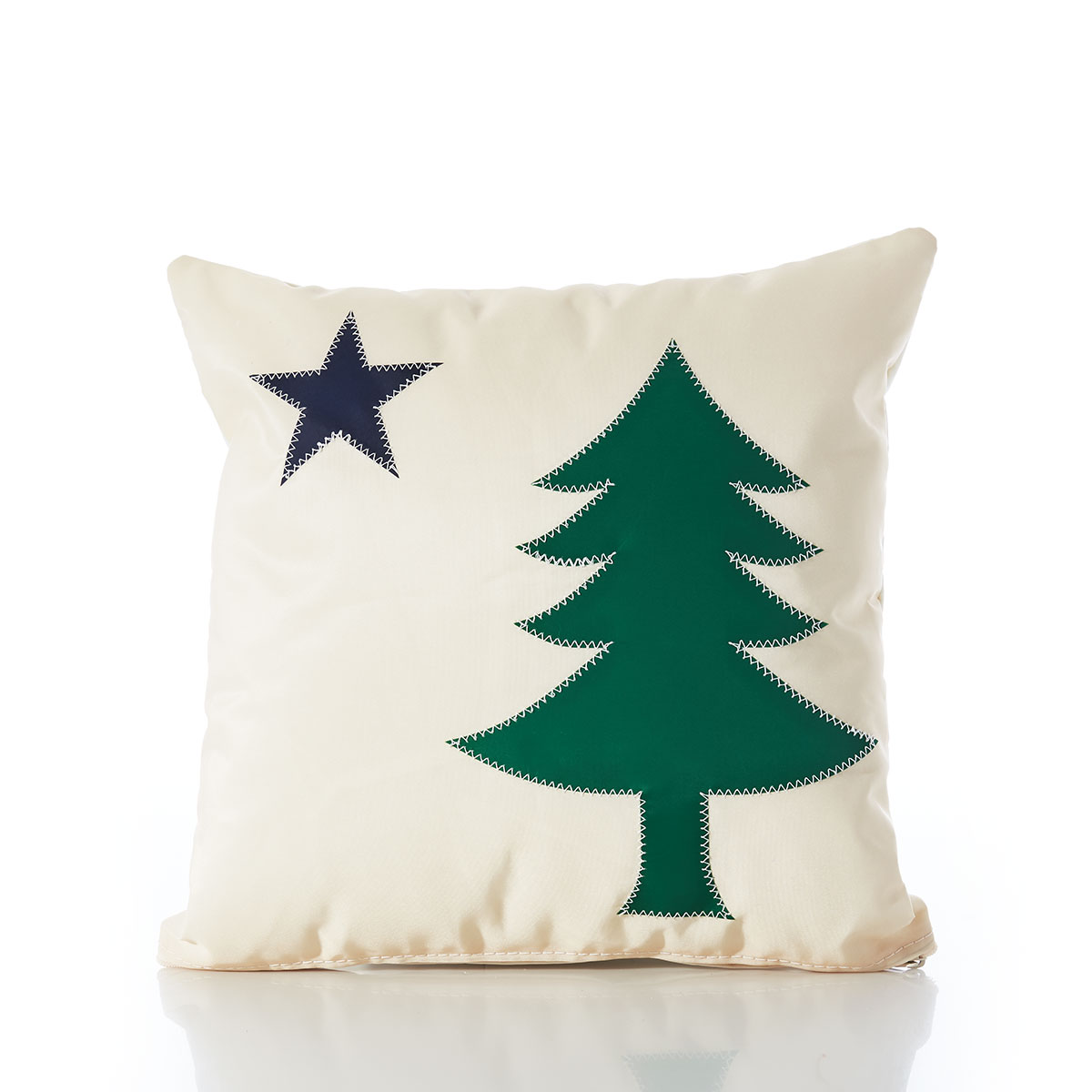 recycled sail cloth pillow featuring a navy star and green pine tree from Maine's original state flag, with hemp rope handles