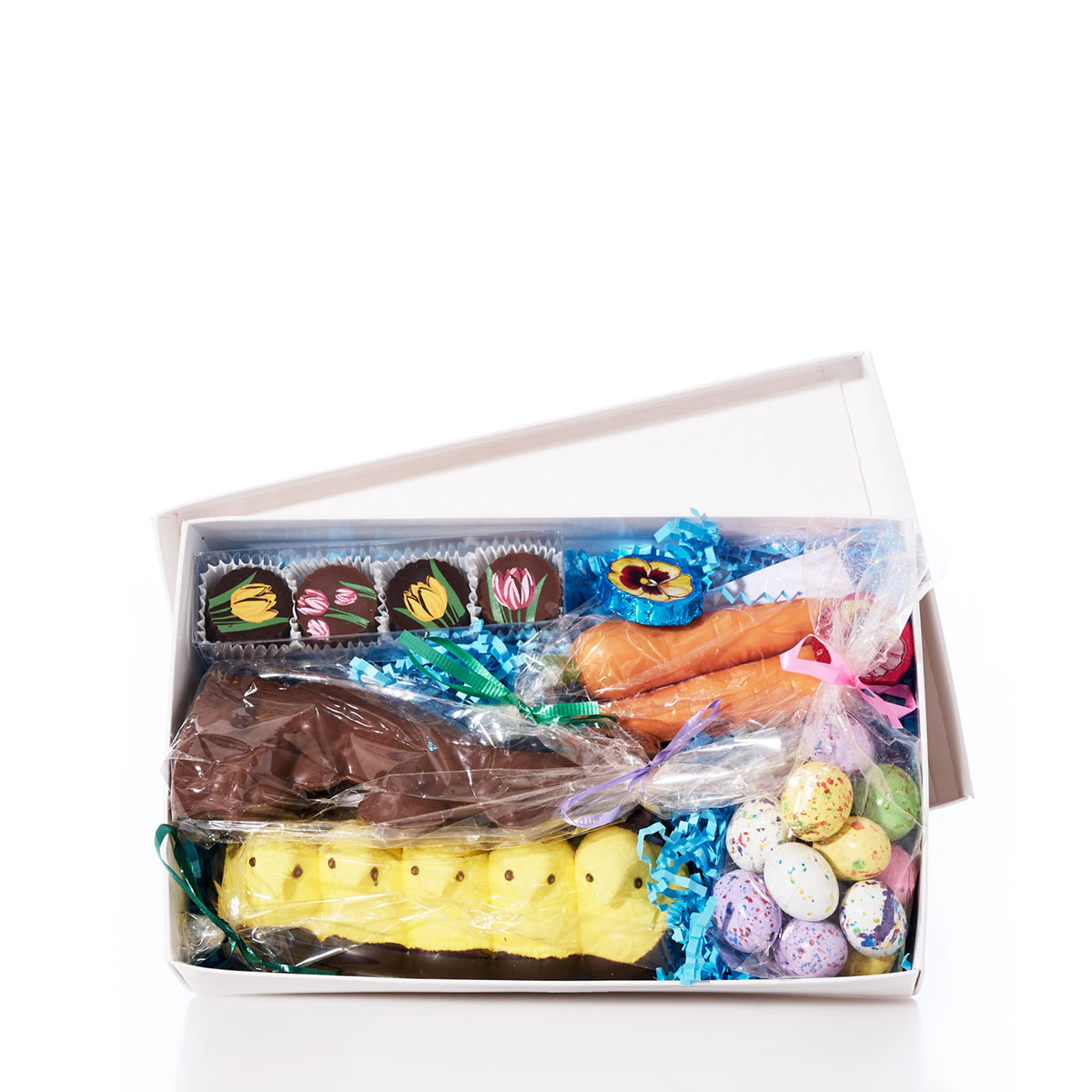 a box of Easter themed packaged chocolate and candy treats