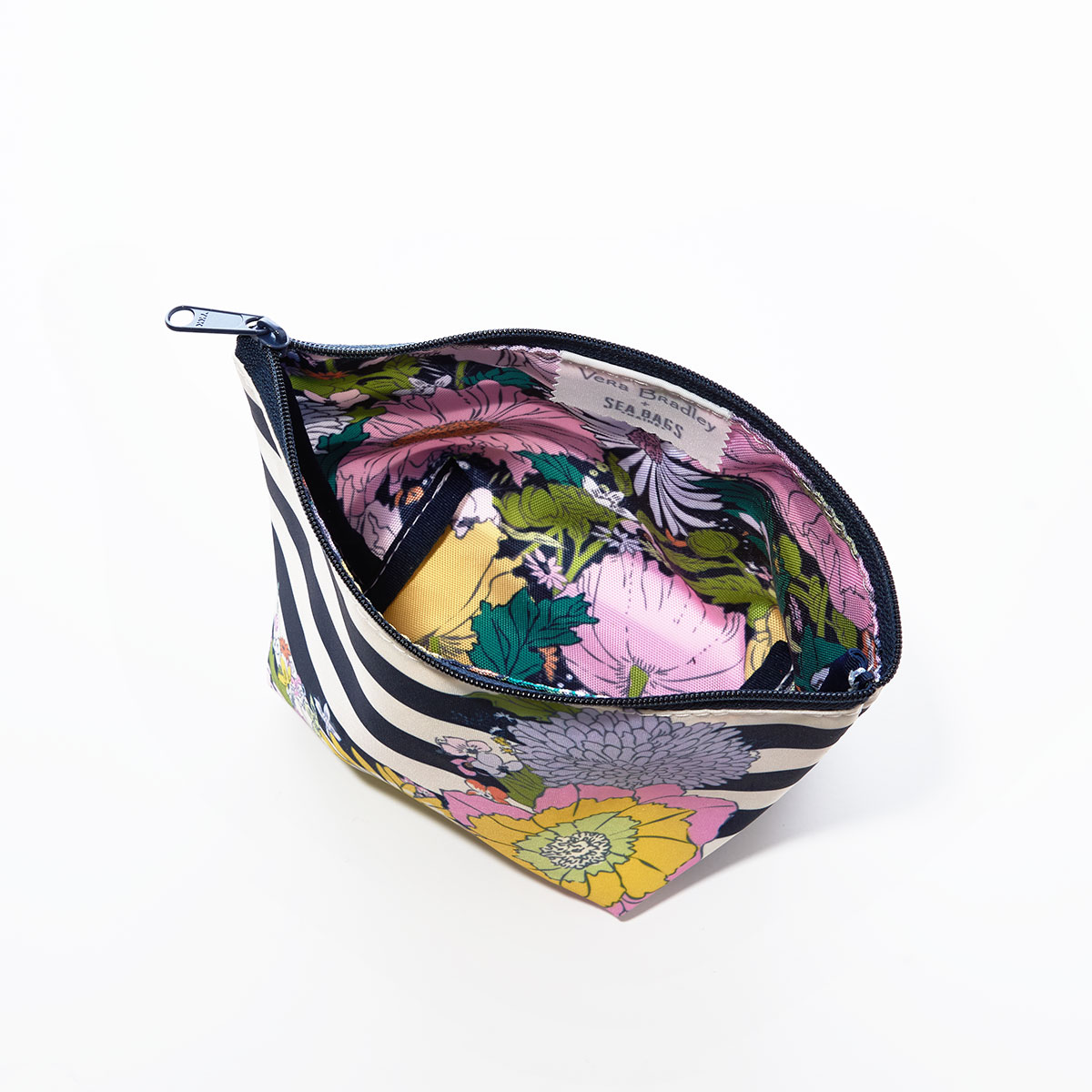 inside view of open cosmetic pouch with bright floral print lining