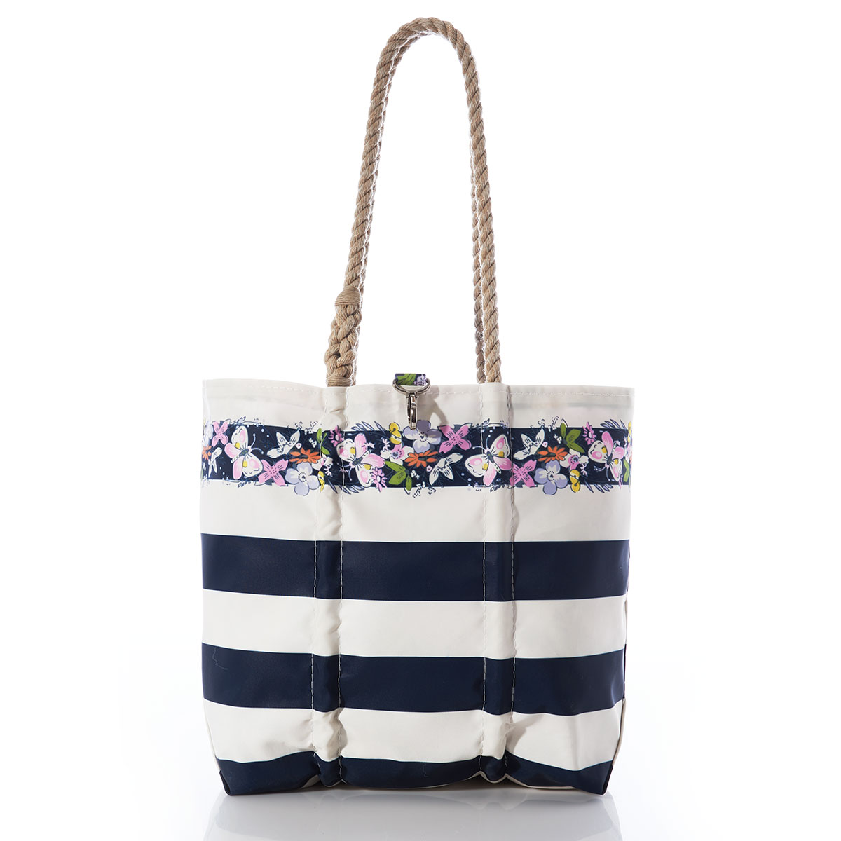 bold navy and white striped recycled sail cloth medium tote with hemp rope handles and top clasp embellished with flowers around the top