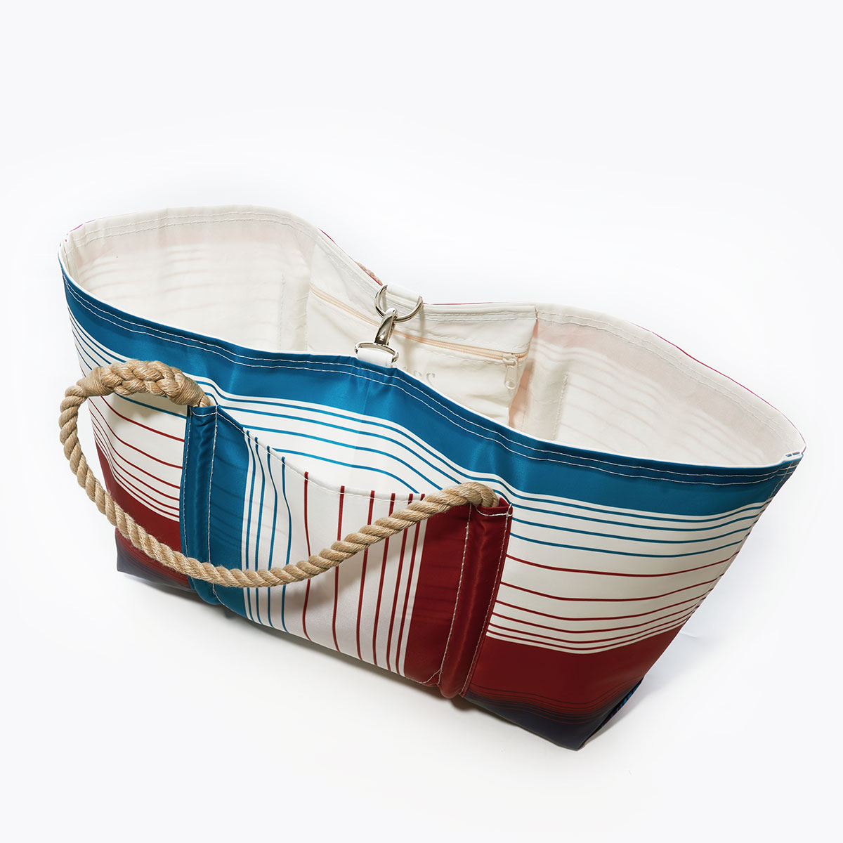 clasp closure of patriotic plaid stripes in red white and blue printed on recycled sail cloth large pier tote with hemp rope handles